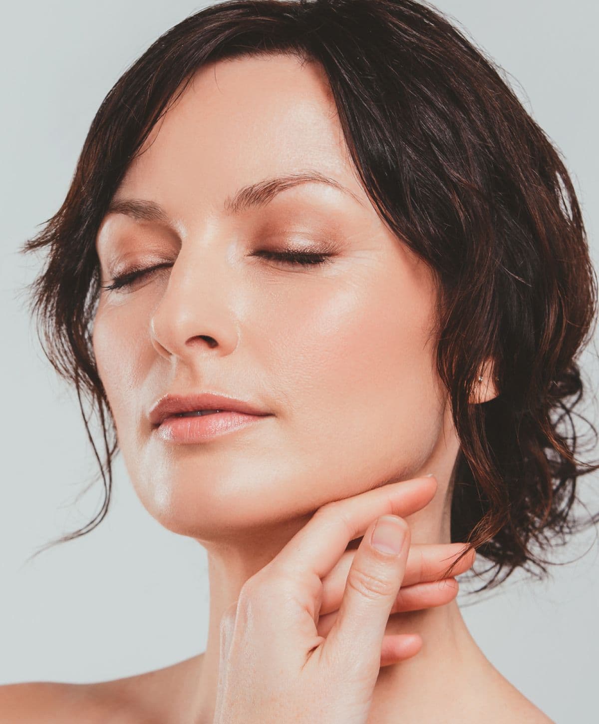 Client receiving custom facial treatment at Studio Luveria